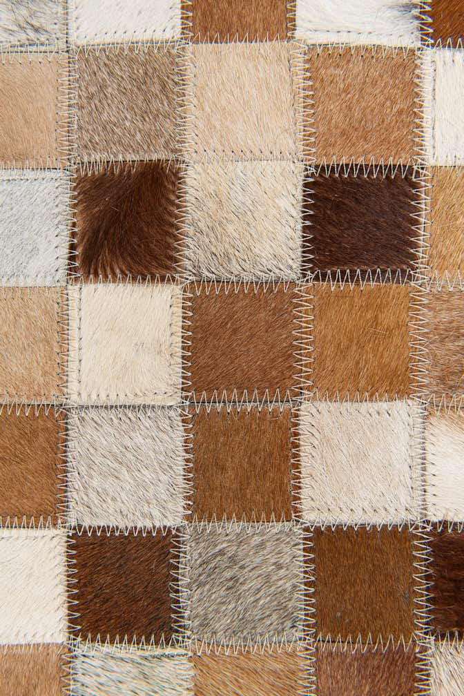 5' x 7' 11 Cowhide Stocks Rug