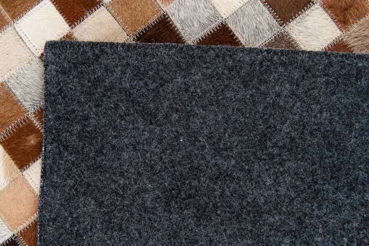 5' x 7' 11 Cowhide Stocks Rug