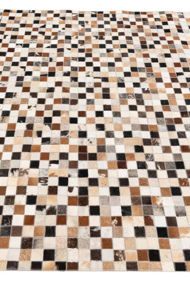 Detail image of 5' x 7' 11 Cowhide Stocks Rug