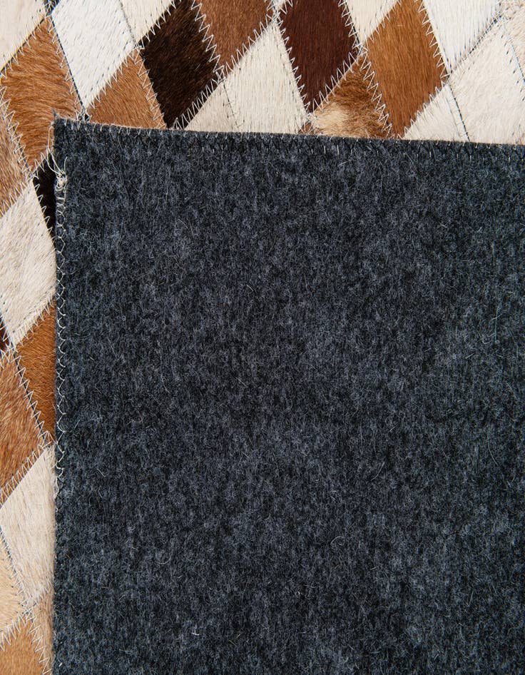 Detail image of 5' 1 x 7' 11 Cowhide Stocks Rug
