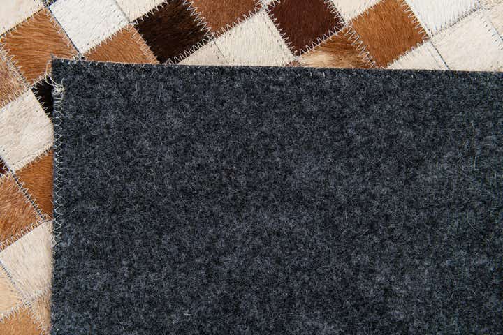 5' 1 x 7' 11 Cowhide Stocks Rug