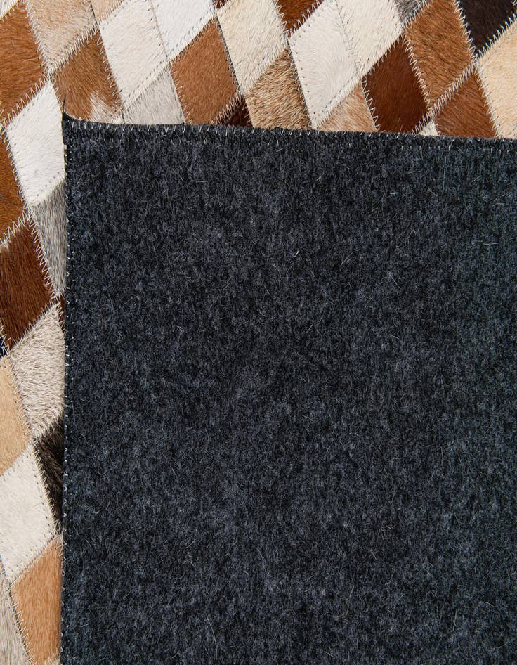 Detail image of 5' 1 x 7' 11 Cowhide Stocks Rug