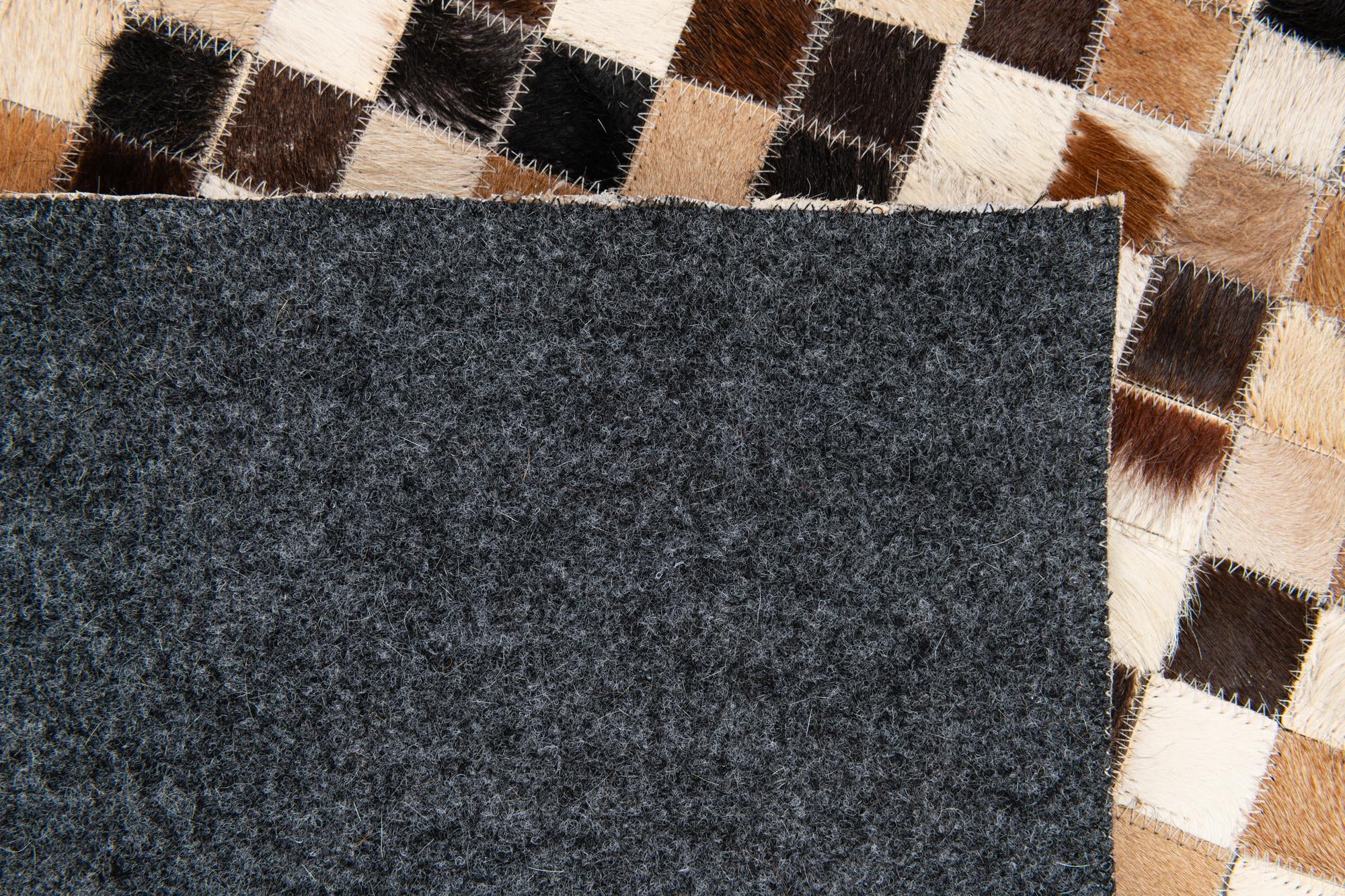 5' 5 x 7' 7 Cowhide Stocks Rug
