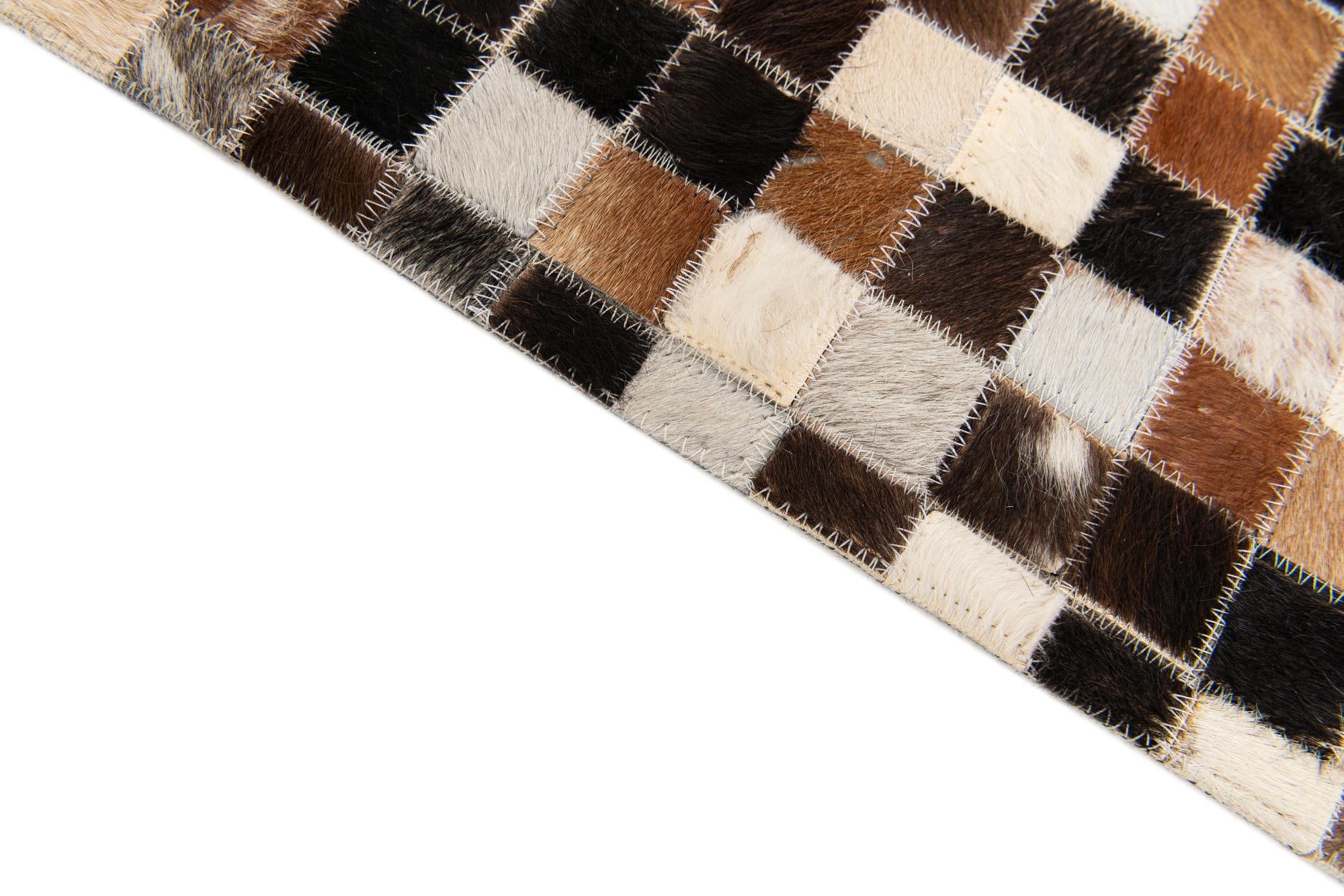 5' 3 x 7' 7 Cowhide Stocks Rug