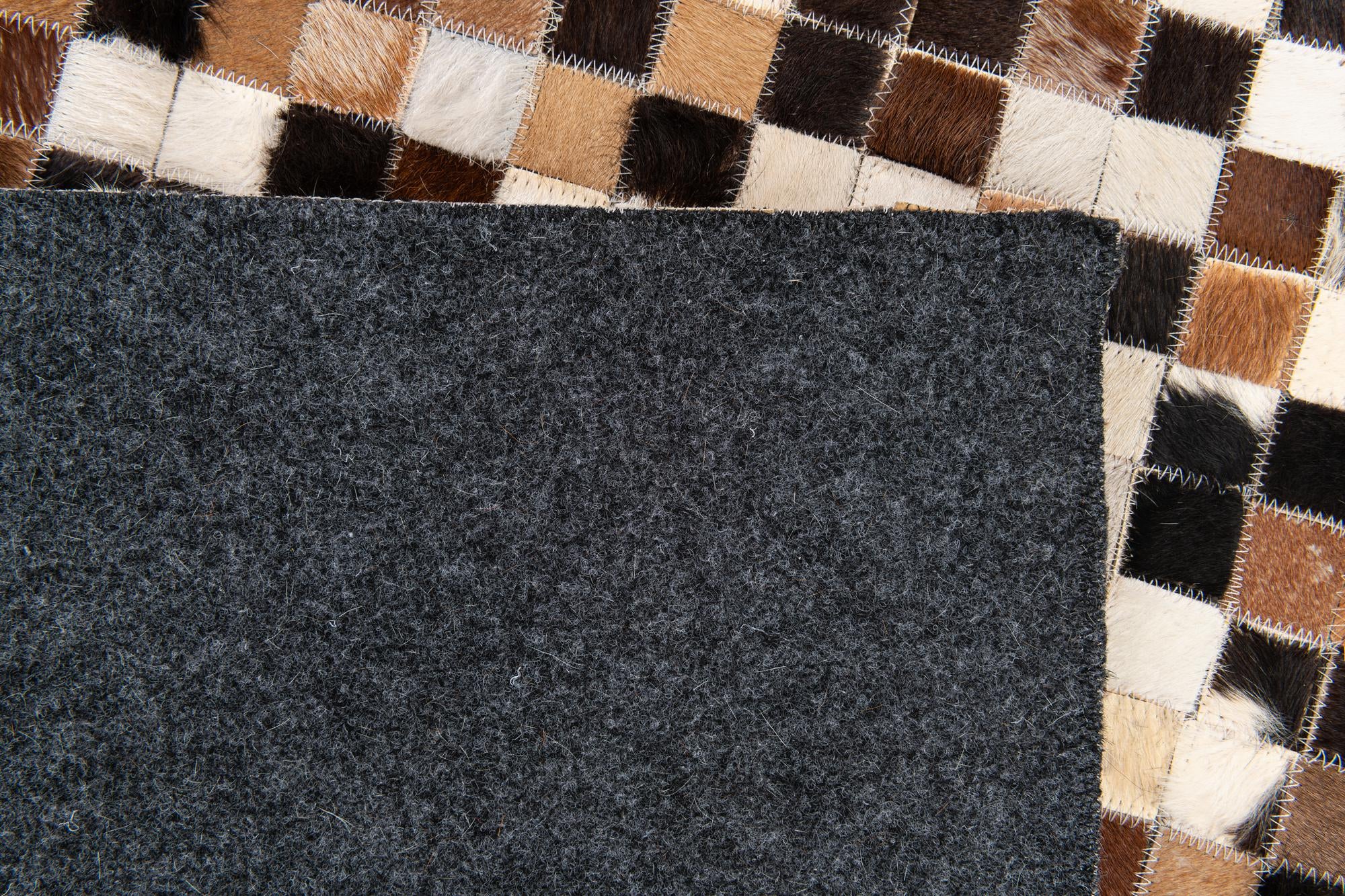 5' 3 x 7' 7 Cowhide Stocks Rug