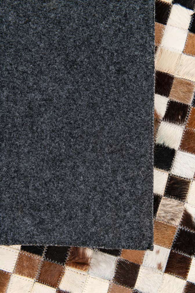 5' 5 x 7' 7 Cowhide Stocks Rug