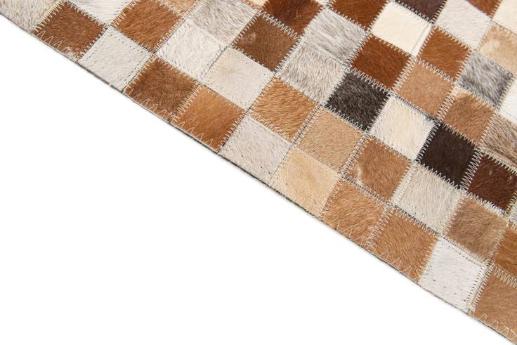 Detail image of 5' x 7' 10 Cowhide Stocks Rug