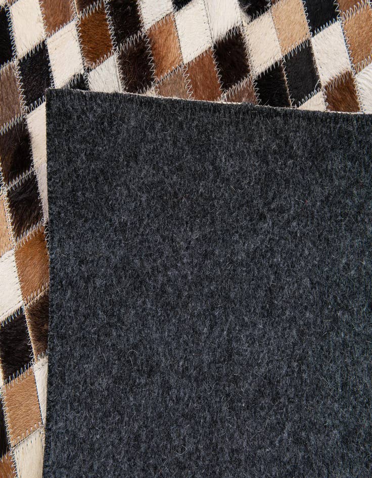 Detail image of 5' 5 x 7' 8 Cowhide Stocks Rug