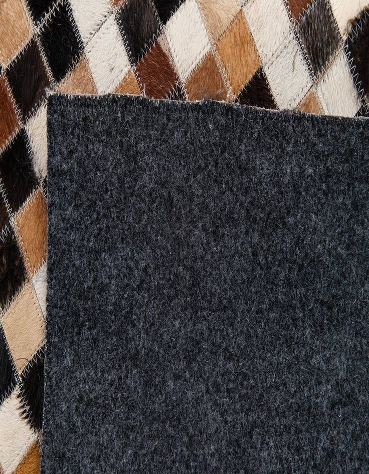 Detail image of 5' 5 x 7' 8 Cowhide Stocks Rug