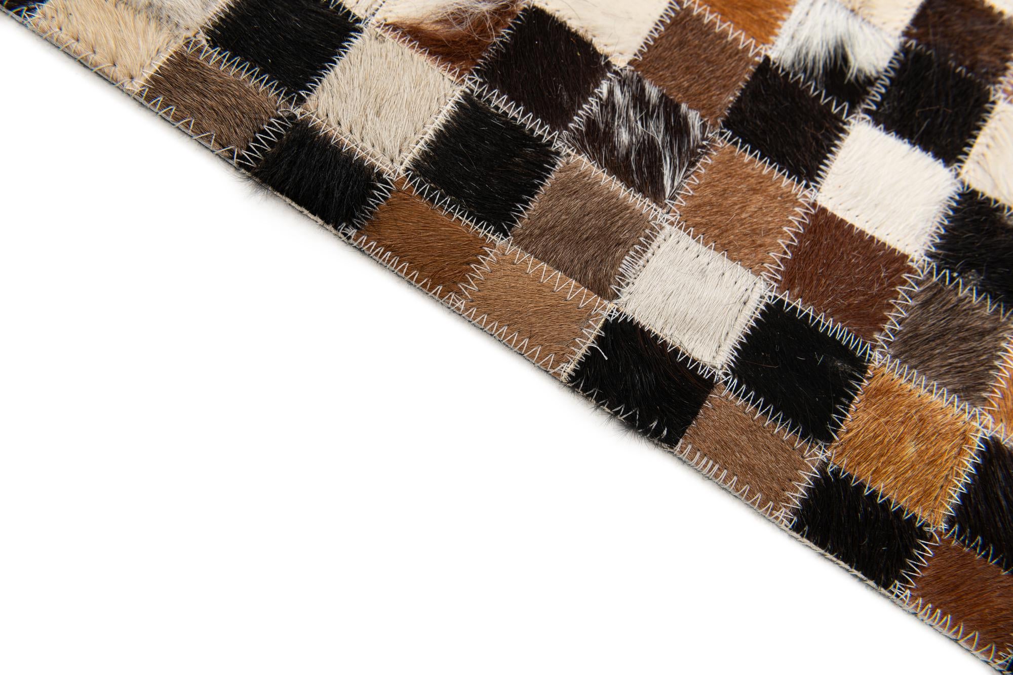 5' 5 x 7' 7 Cowhide Stocks Rug