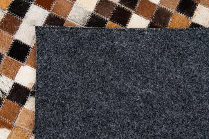 5' 5 x 7' 7 Cowhide Stocks Rug