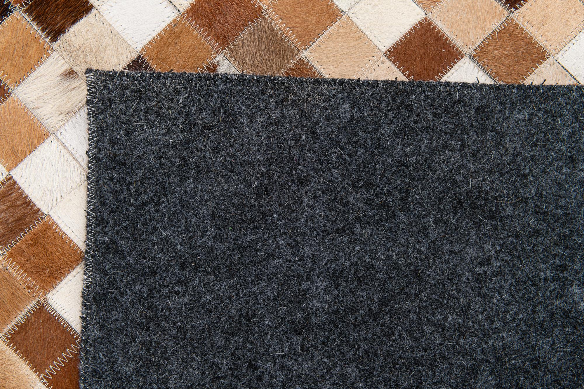 5' 2 x 7' 11 Cowhide Stocks Rug