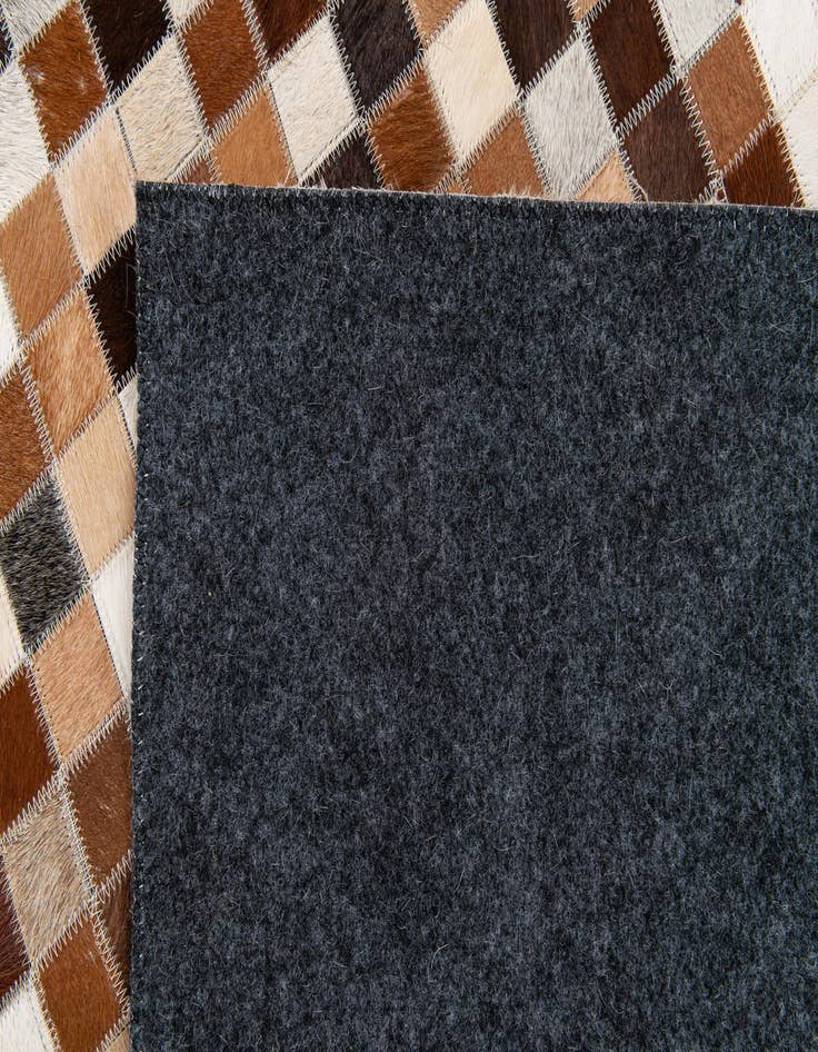 Detail image of 5' 1 x 7' 11 Cowhide Stocks Rug