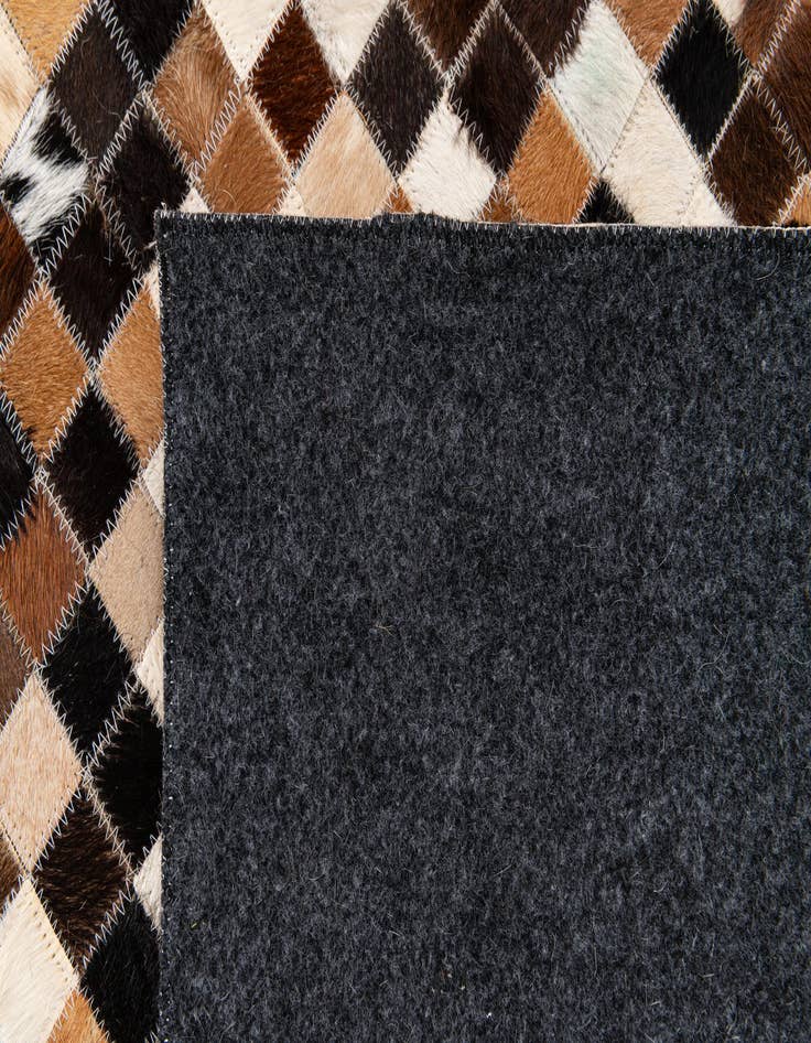 Detail image of 5' 6 x 7' 7 Cowhide Stocks Rug