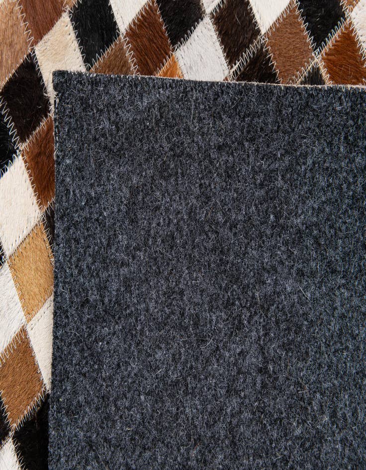 Detail image of 5' 6 x 7' 9 Cowhide Stocks Rug