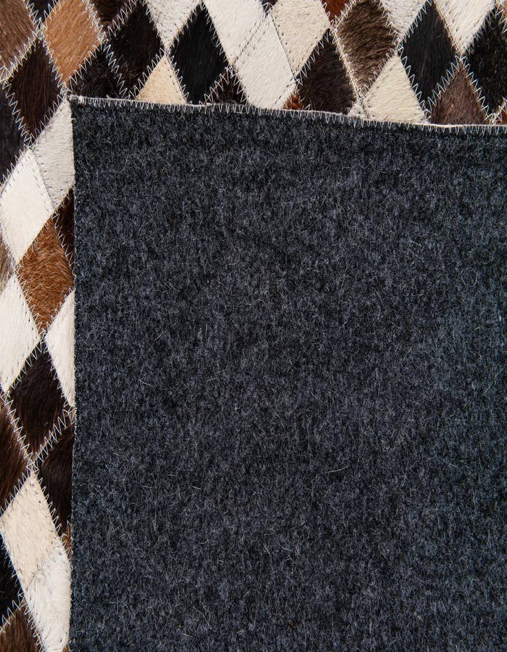 Detail image of 5' 6 x 7' 6 Cowhide Stocks Rug