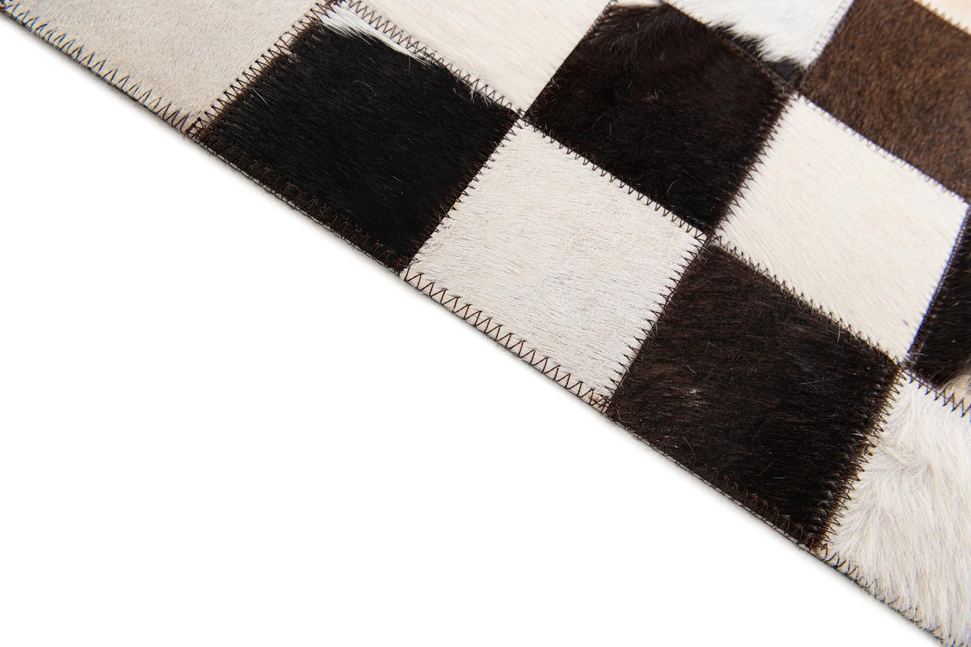 5' x 8' Cowhide Stocks Rug