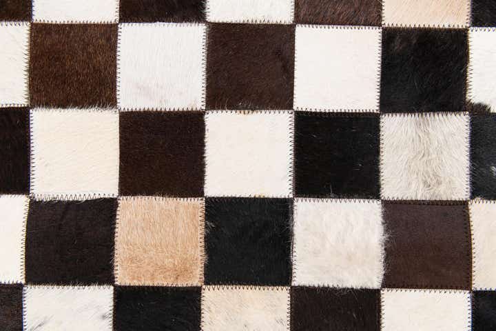 5' x 8' Cowhide Stocks Rug