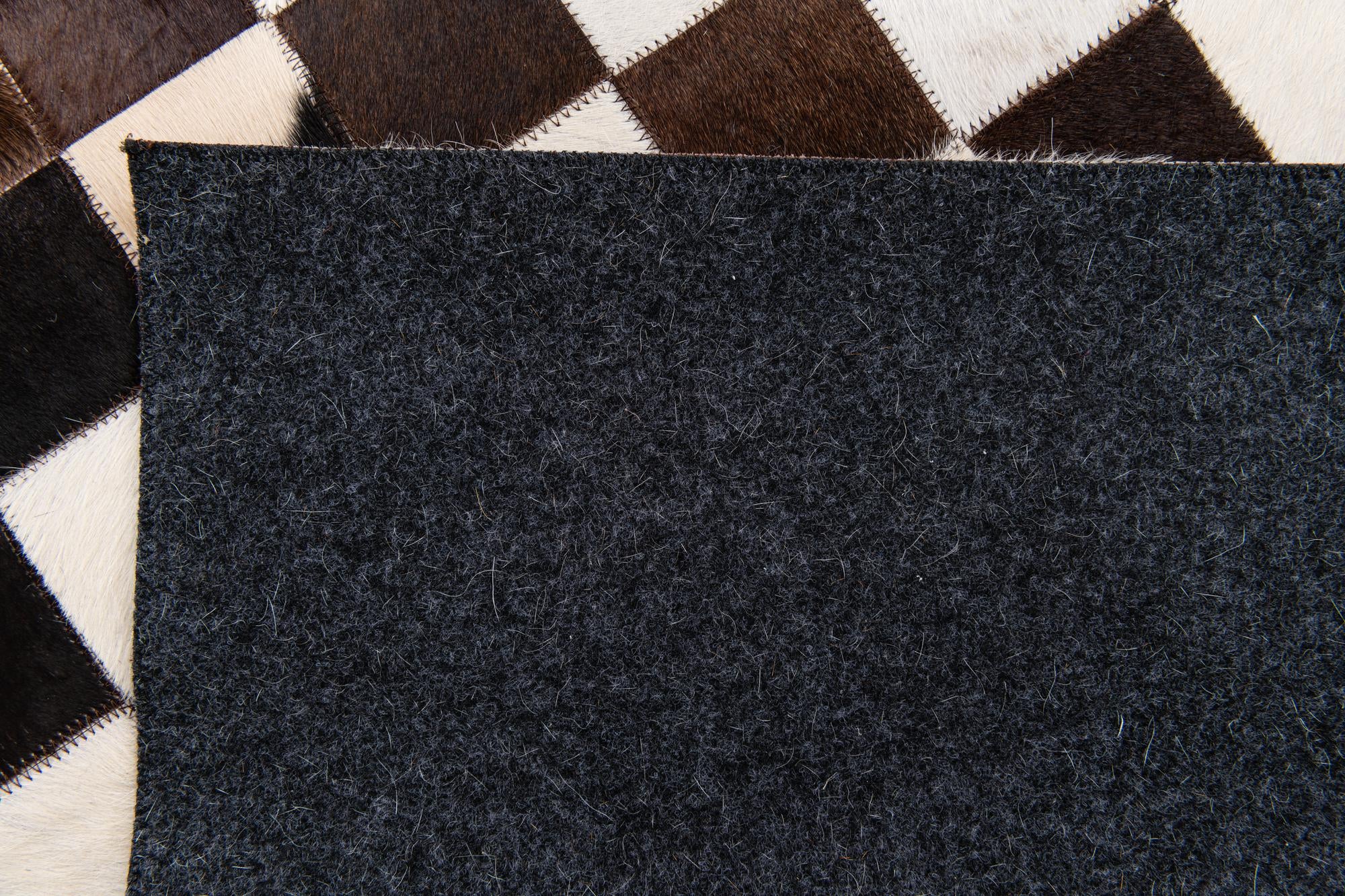 5' x 8' Cowhide Stocks Rug