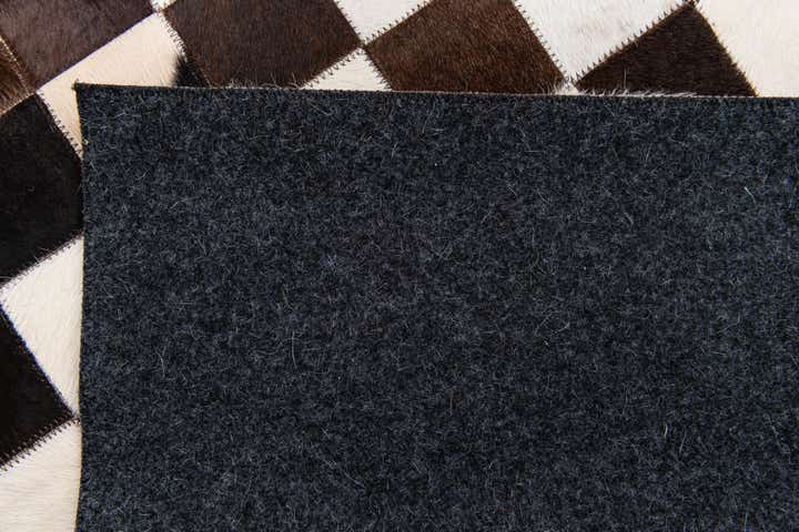 5' x 8' Cowhide Stocks Rug