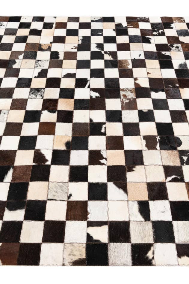 Detail image of 5' x 7' 11 Cowhide Stocks Rug