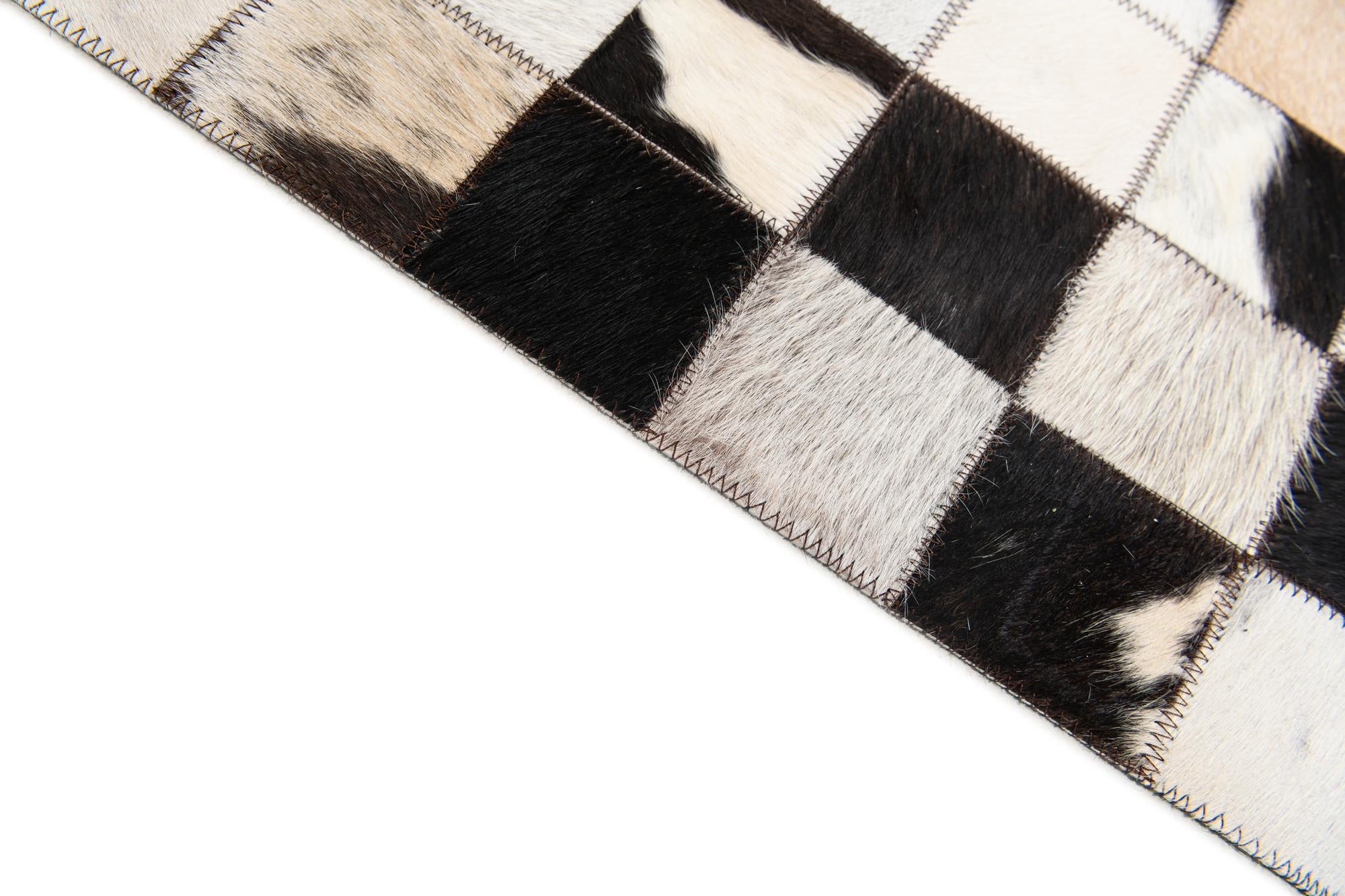 5' x 7' 11 Cowhide Stocks Rug