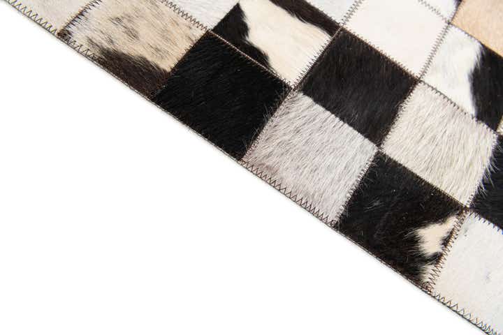 5' x 7' 11 Cowhide Stocks Rug