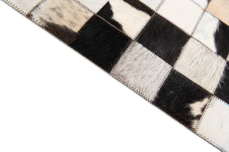 Detail image of 5' x 7' 11 Cowhide Stocks Rug