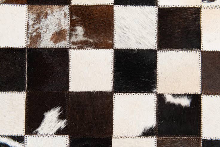 Detail image of 5' x 7' 11 Cowhide Stocks Rug