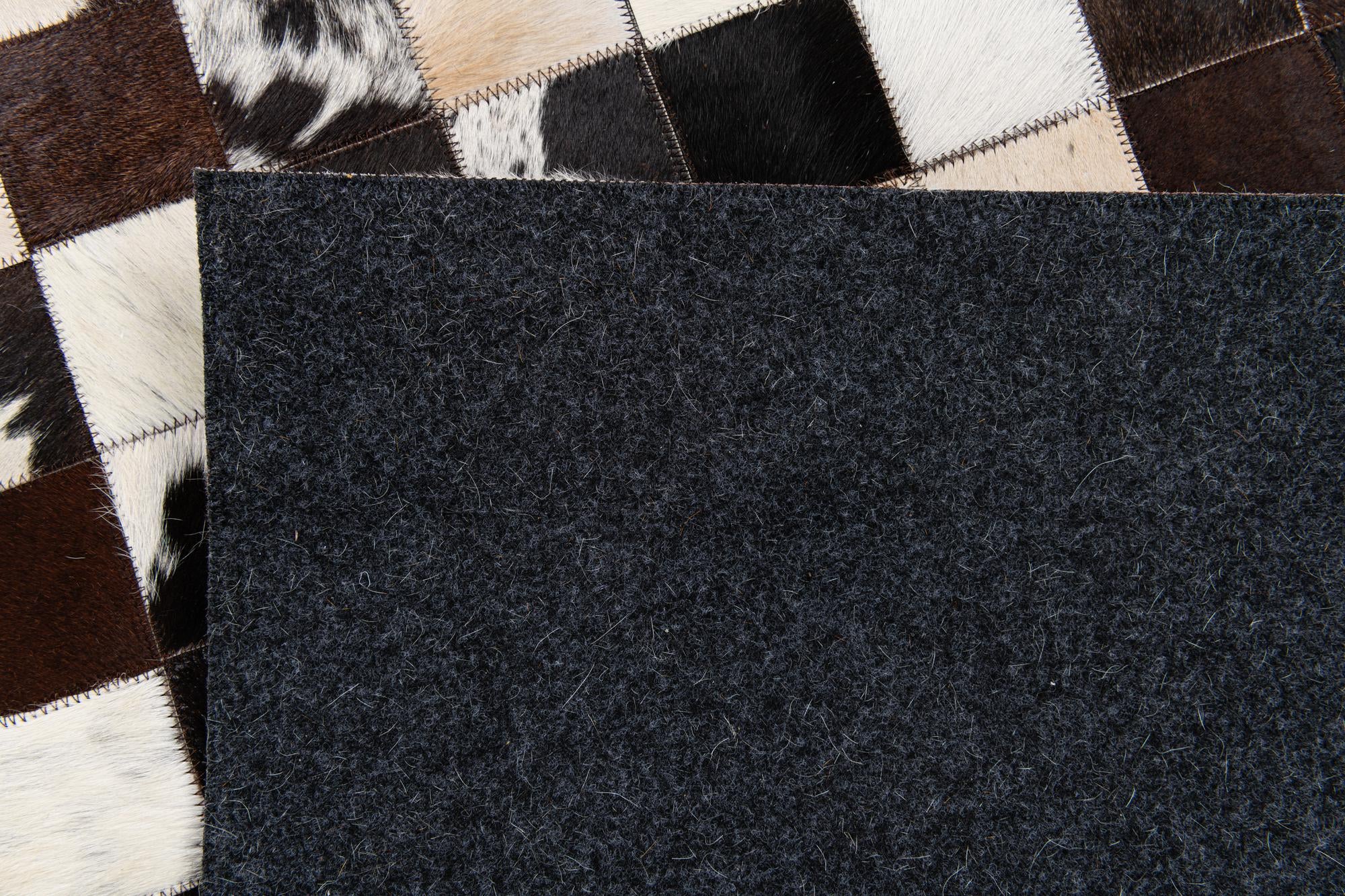 5' x 7' 11 Cowhide Stocks Rug