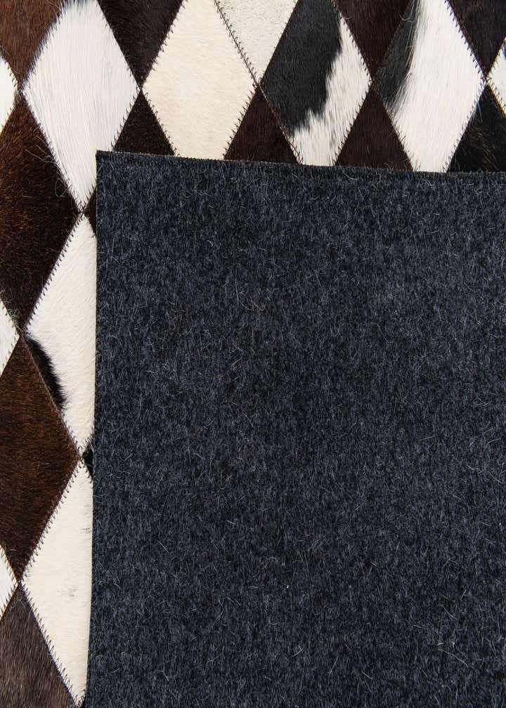 5' x 8' Cowhide Stocks Rug