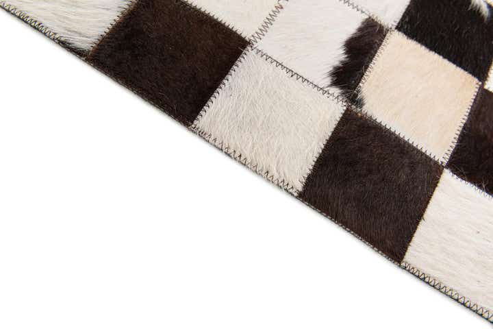 5' x 8' Cowhide Stocks Rug