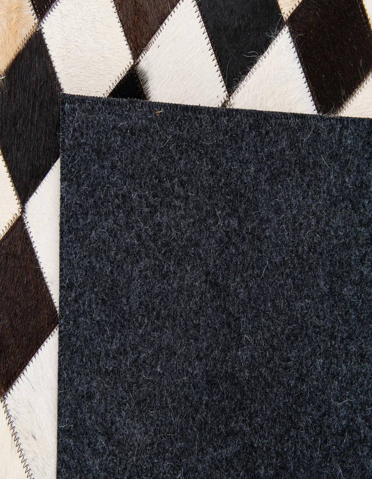 Detail image of 5' x 8' Cowhide Stocks Rug