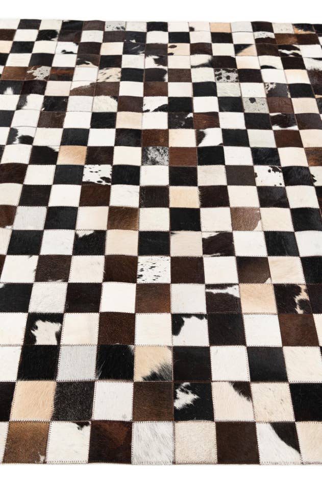 Detail image of 5' 1 x 8' Cowhide Stocks Rug