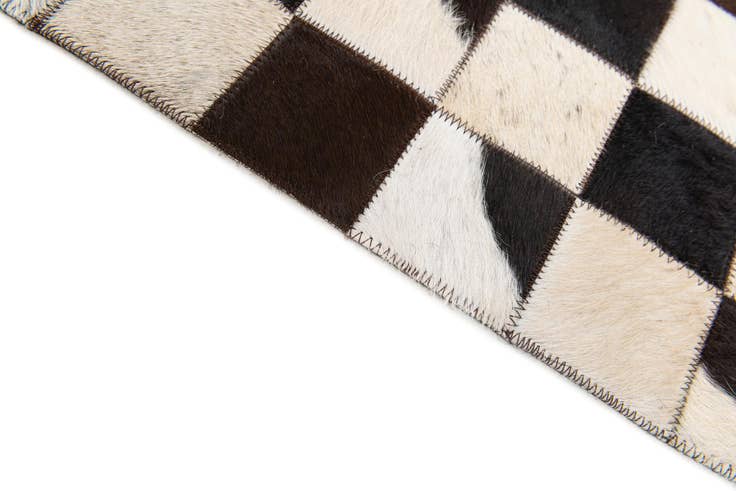 Detail image of 5' 1 x 8' Cowhide Stocks Rug