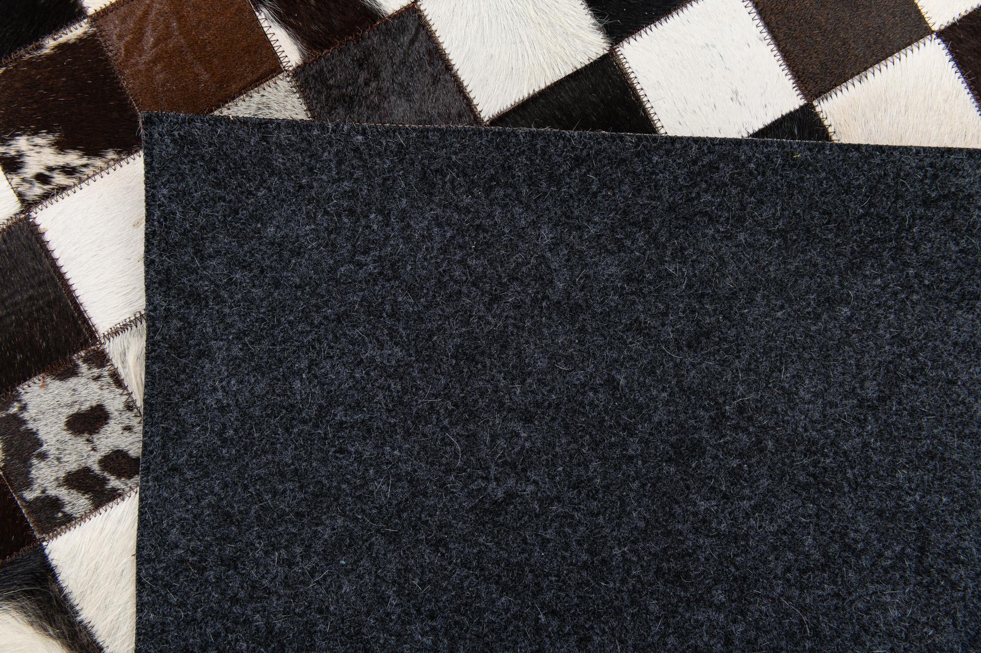 5' 1 x 8' Cowhide Stocks Rug