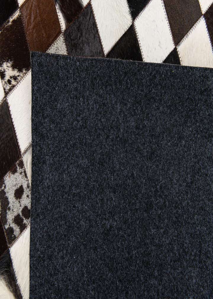 5' 1 x 8' Cowhide Stocks Rug