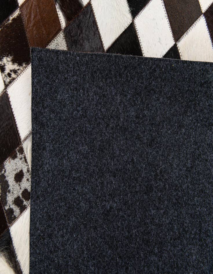 Detail image of 5' 1 x 8' Cowhide Stocks Rug