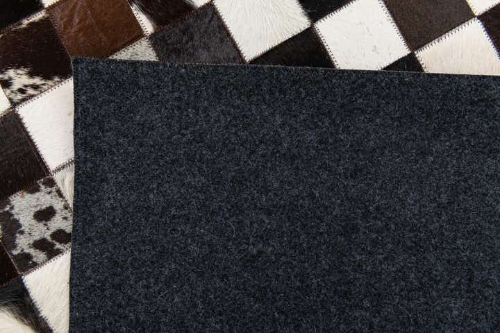 5' 1 x 8' Cowhide Stocks Rug