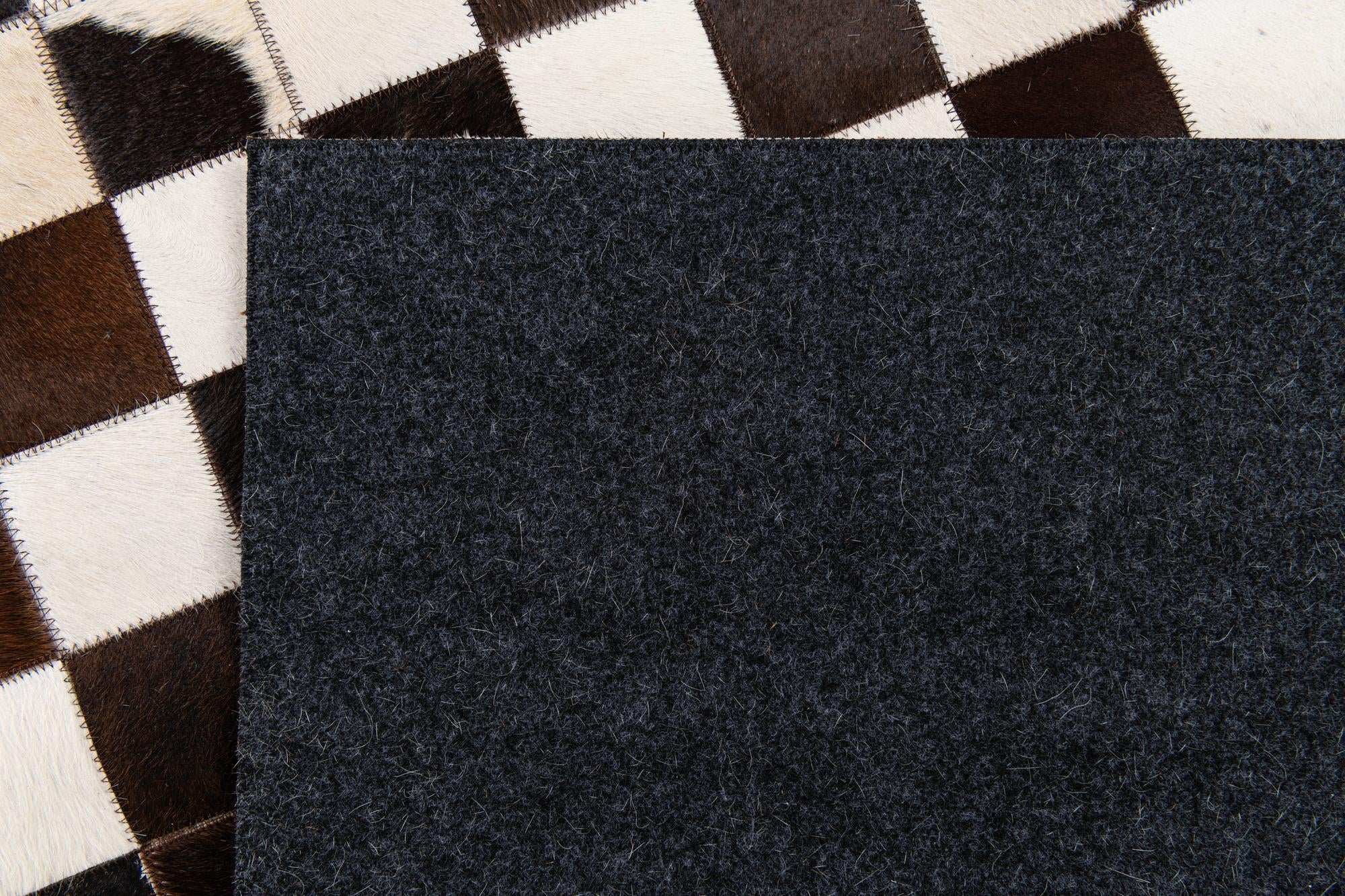 5' 1 x 8' Cowhide Stocks Rug