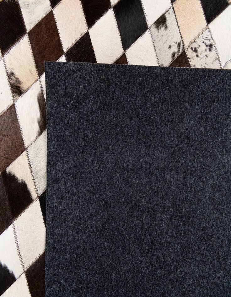 Detail image of 5' 1 x 7' 11 Cowhide Stocks Rug