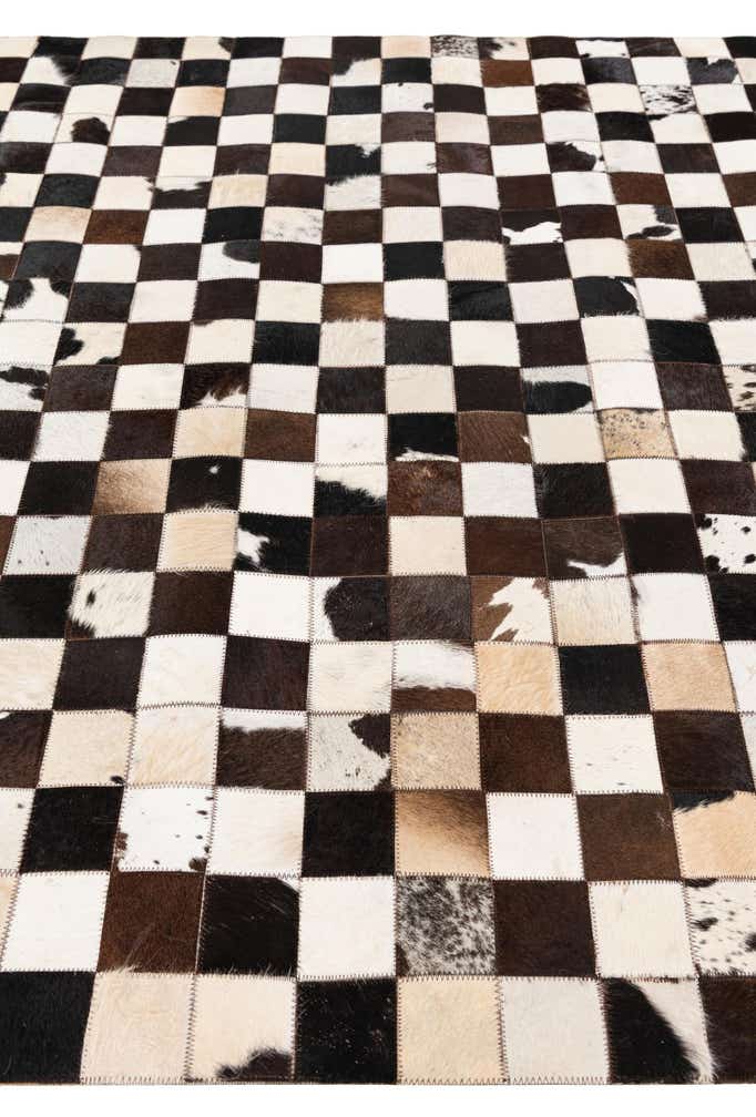 5' x 7' 11 Cowhide Stocks Rug