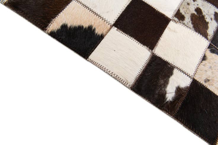 Detail image of 5' x 7' 11 Cowhide Stocks Rug