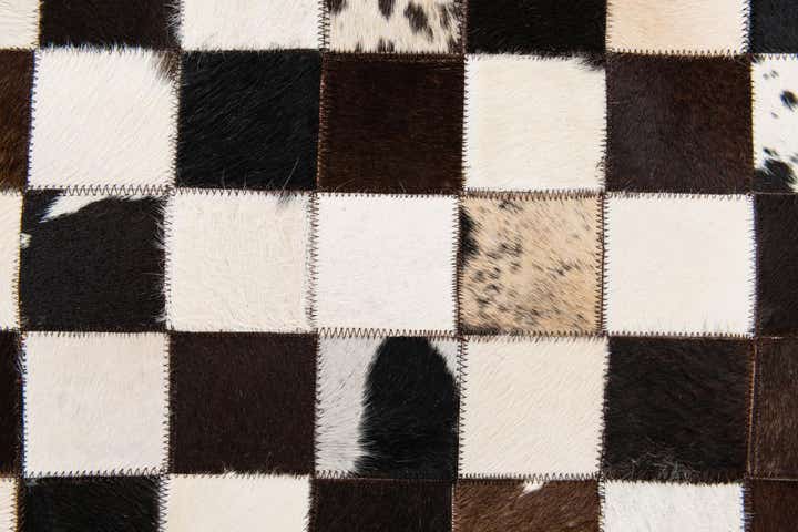 5' x 7' 11 Cowhide Stocks Rug