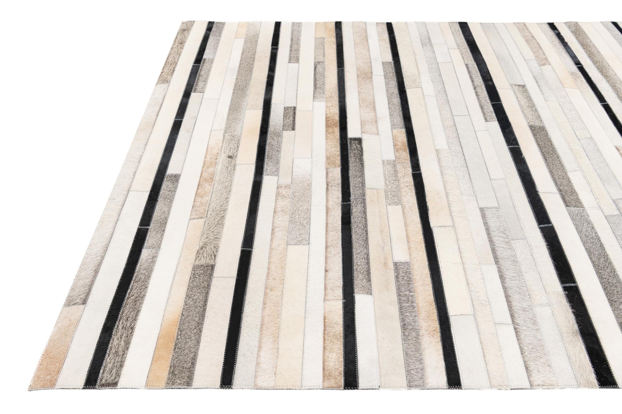 5' 1 x 7' 11 Cowhide Stocks Rug