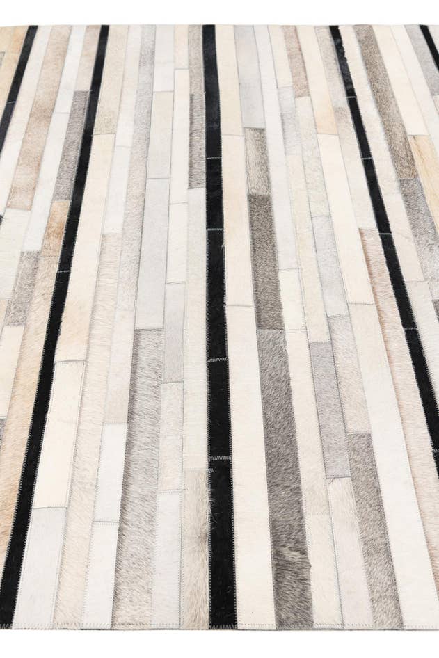 Detail image of 5' 1 x 7' 11 Cowhide Stocks Rug