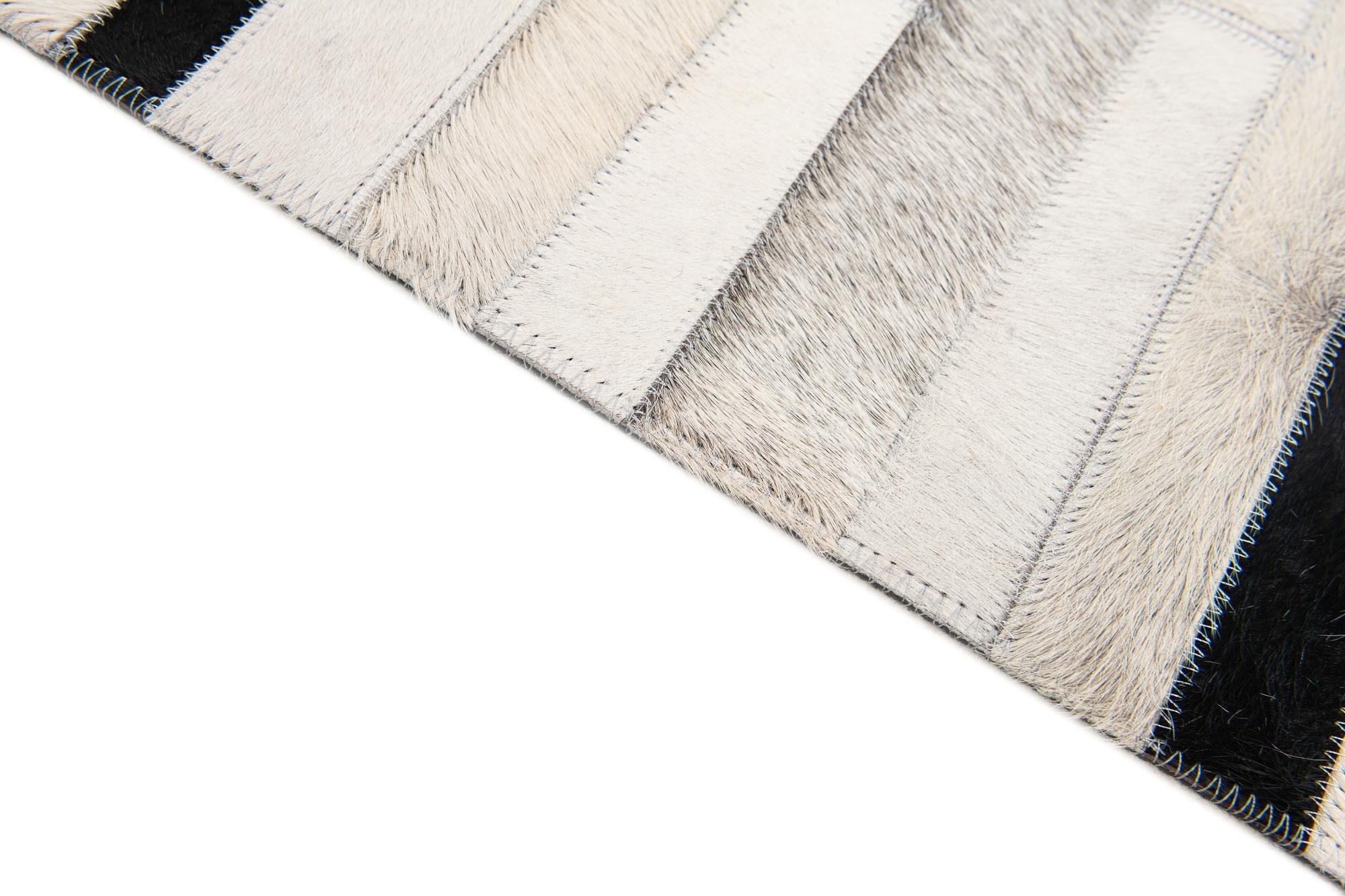 5' 1 x 7' 11 Cowhide Stocks Rug