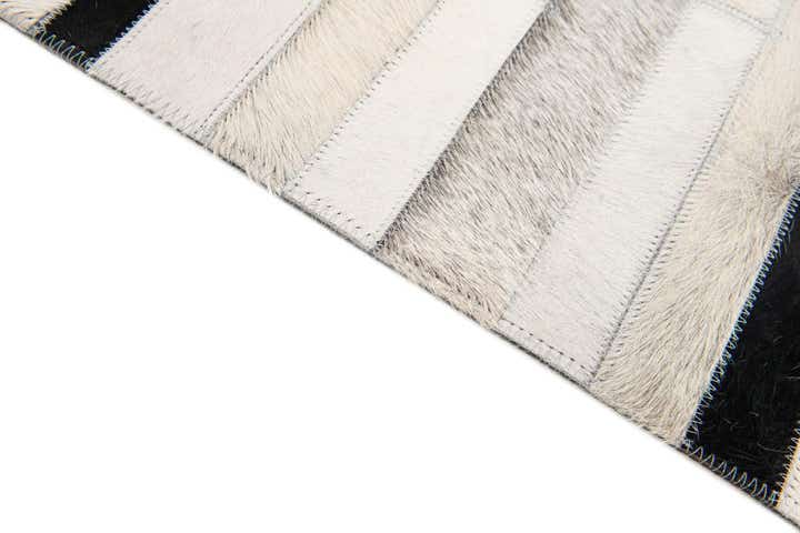 5' 1 x 7' 11 Cowhide Stocks Rug