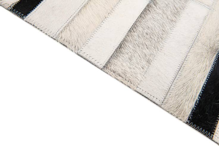 Detail image of 5' 1 x 7' 11 Cowhide Stocks Rug