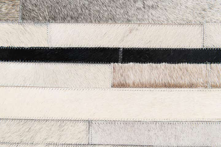 5' 1 x 7' 11 Cowhide Stocks Rug